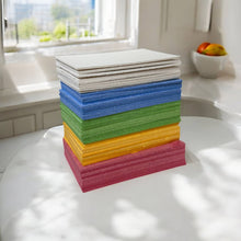Load image into Gallery viewer, Stack of multicolored cellulose sponges.