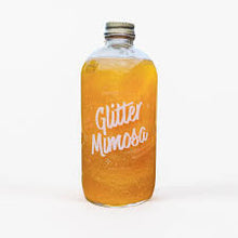 Load image into Gallery viewer, Glass bottle of Glitter Mimosa non alcoholic mix in tangerine mango flavor