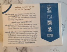 Load image into Gallery viewer, Close up of the back of the Stain Stick box, with instructions, company vision and "About Meliora."