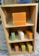 Load image into Gallery viewer, Images of no waste soap bars in a display shelf