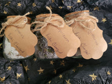 Load image into Gallery viewer, Three jars of reiki-charged bath salts, inspired by the Zodiac. Aquarius, Capricorn, and Sagittarius, sitting on a black paper with stars.