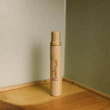 Load image into Gallery viewer, A bamboo toothbrush, shown in its case, by Bamboo Switch