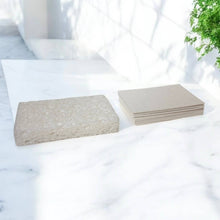 Load image into Gallery viewer, Image shows white cellulose sponge, dry, and when damp.