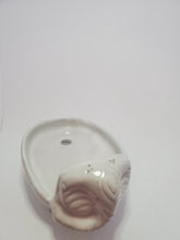 Load image into Gallery viewer, A white ceramic elephant shaped soap holder. It has two holes for drainage.