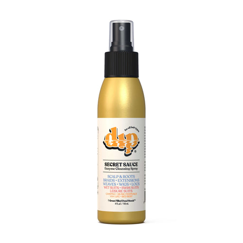 A gold aluminum bottle wof dip's Secret Sauce Enzyme Cleaning Spray