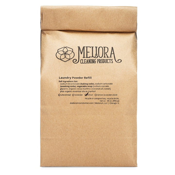 A brown paper bag of Meliora laundry powder.