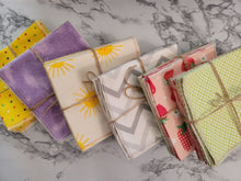 Load image into Gallery viewer, Six sets of six cotton flannel Unpaper towels wrapped with twine. Locally made in Wheaton, MD

