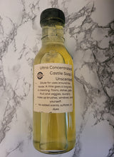Load image into Gallery viewer, An upcycled glass jar, pre-filled with Rustic Strength brand ultra-concentrated Castile soap.
