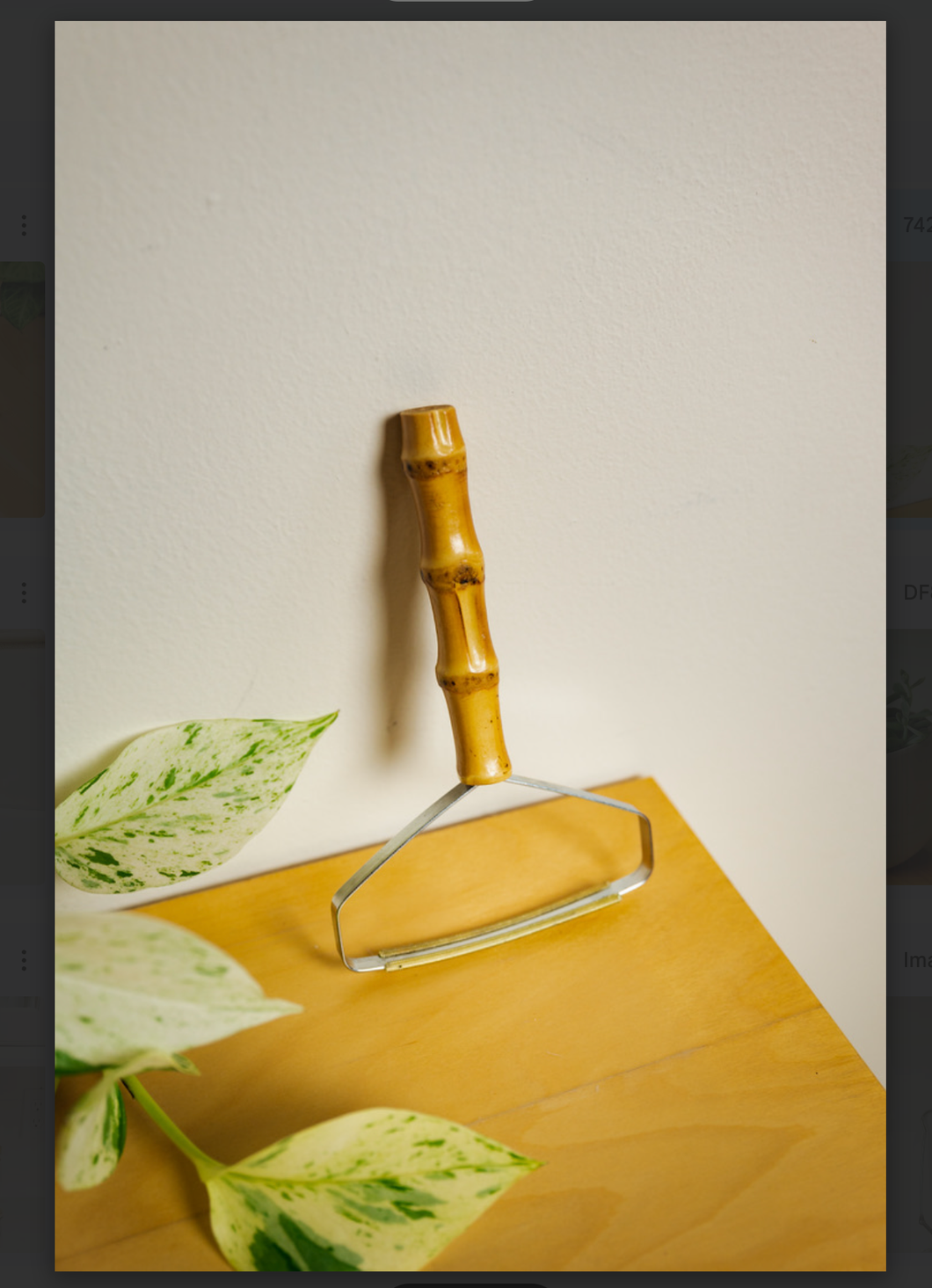 Zero Waste bamboo lint roller sitting on a table.