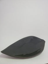 Load image into Gallery viewer, A black, high gloss, leaf shaped ceramic plate made in Cambodia.
